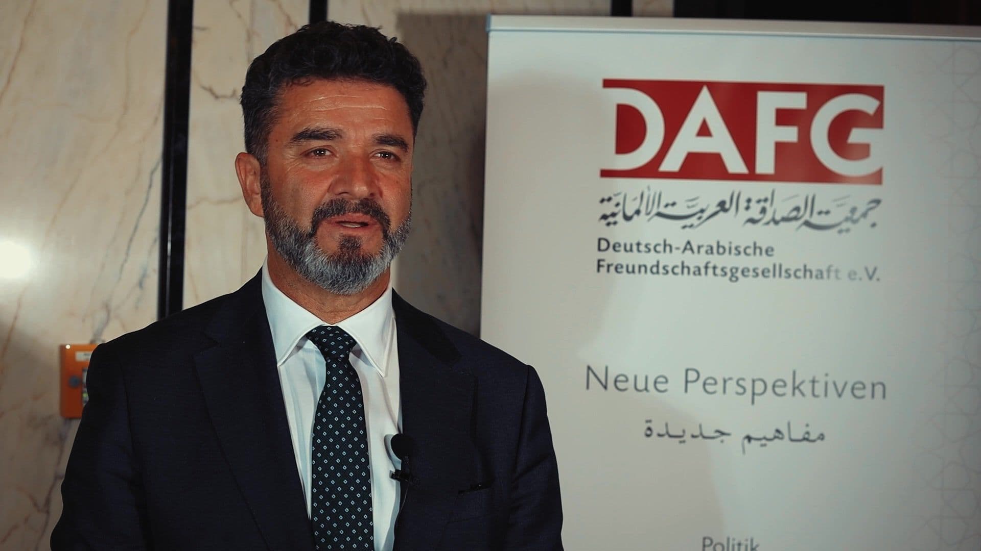 Houssam Maarouf speaking at the eighth German-Arab Gulf Dialogue.